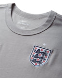 NIKE-ENGLAND X PALACE T-SHIRT PEWTER GREY-IM6598-052